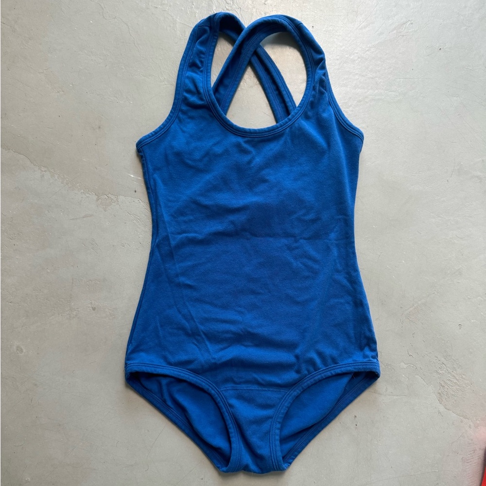 Brand new, never worn ARQ bodysuit in Royal Blue color